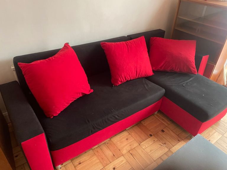 Free L-shaped black and red sofa, pickup in Llanishen