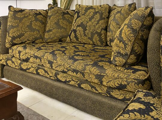Juego de salón en tonos aceitados con sofá-cama en venta